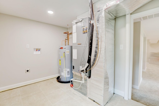 utility room with gas water heater