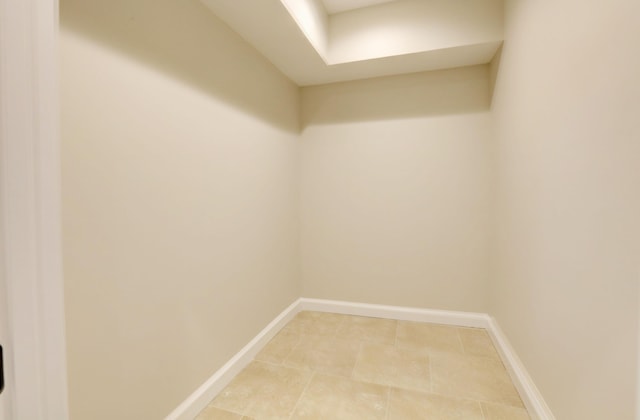 spare room with tile patterned floors