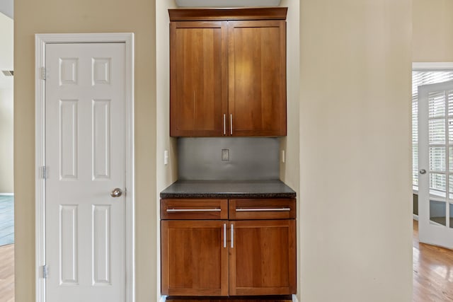 706 Hunter Dr, Lancaster, KY 40444 - kitchen with brown cabinets and dark countertops