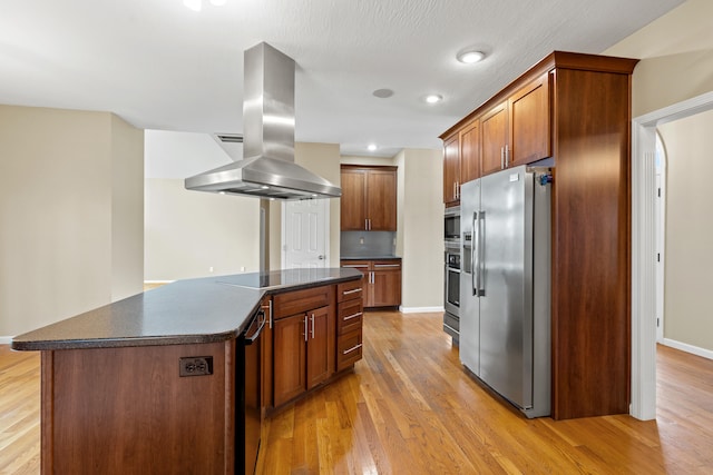 kitchen featuring light hardwood / wood-style floors, a center island, stainless steel refrigerator with ice dispenser, island range hood, and black stovetop