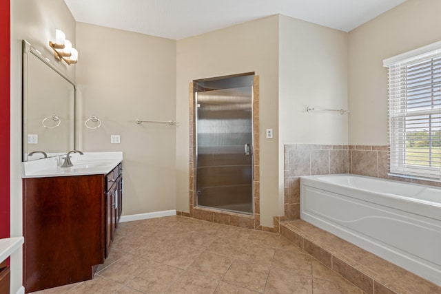 bathroom featuring independent shower and bath, tile patterned flooring, and vanity