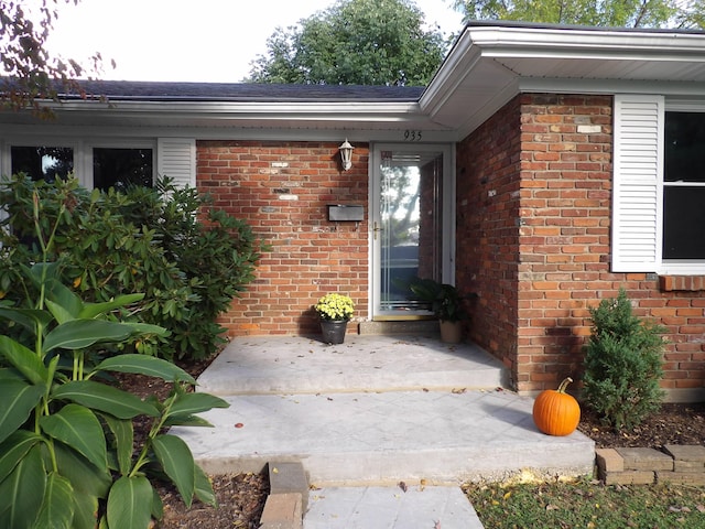 entrance to property featuring a patio