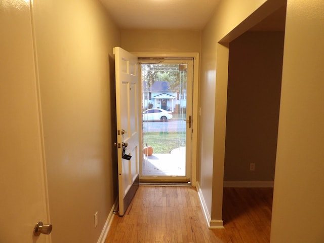 doorway featuring light hardwood / wood-style flooring