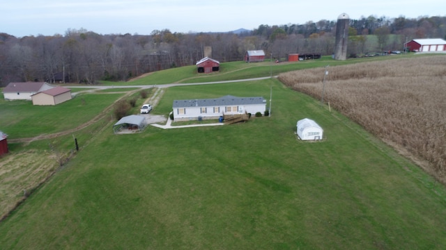 birds eye view of property featuring a rural view