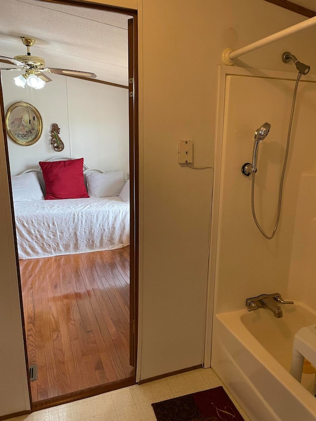 bathroom featuring ceiling fan