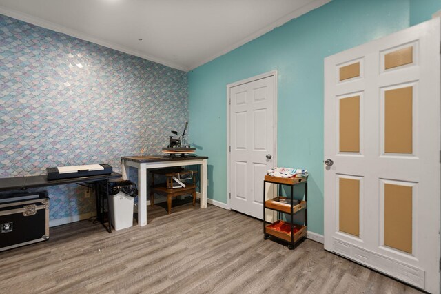 90 Damy Ln, Campton, KY 41301 - office with wallpapered walls, an accent wall, ornamental molding, wood finished floors, and baseboards
