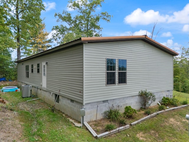 90 Damy Ln, Campton, KY 41301 - view of side of property featuring crawl space and cooling unit
