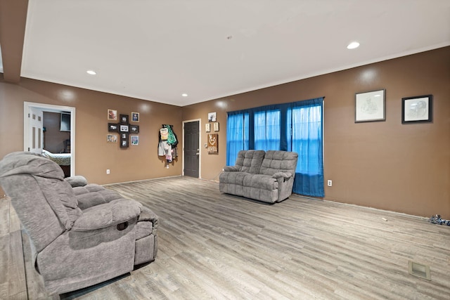 90 Damy Ln, Campton, KY 41301 - living area featuring wood finished floors, recessed lighting, and crown molding