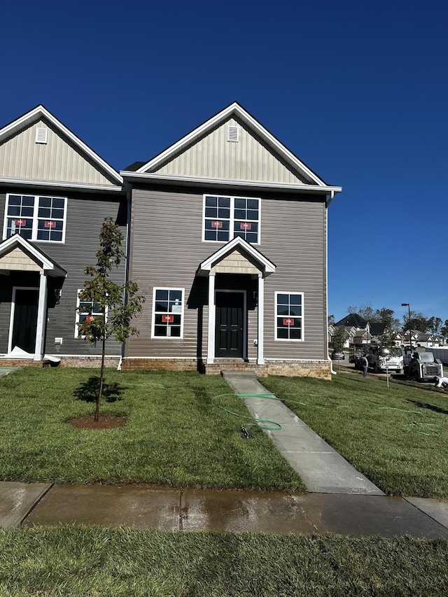 view of front of home with a front yard