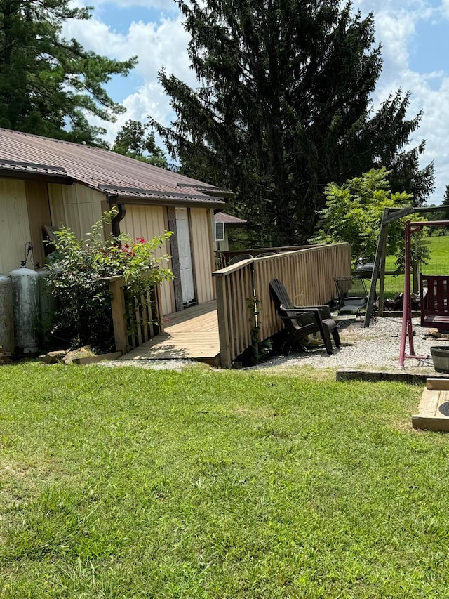 view of yard featuring a wooden deck