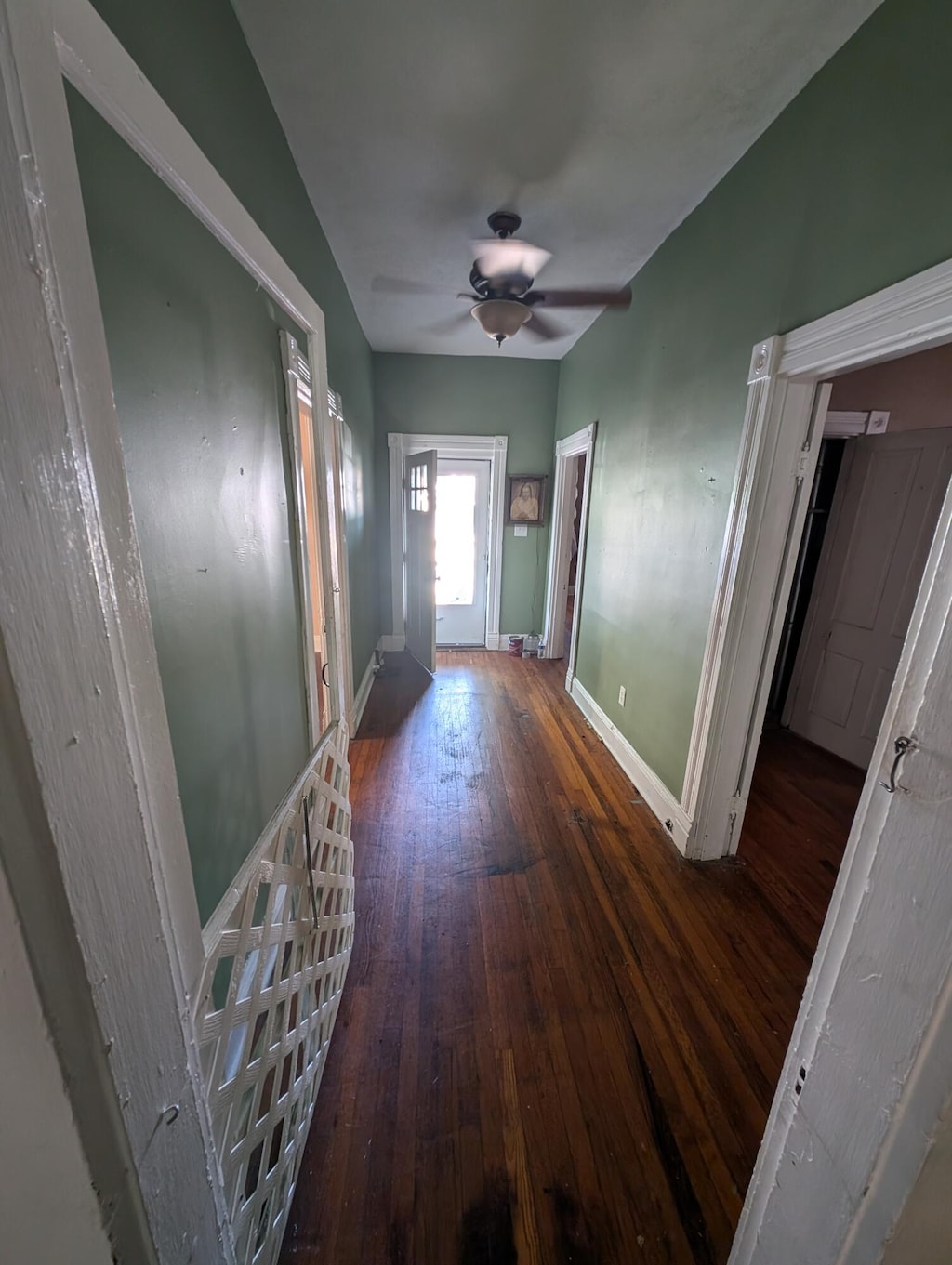 hallway featuring dark hardwood / wood-style floors