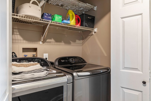 laundry area with washer and dryer