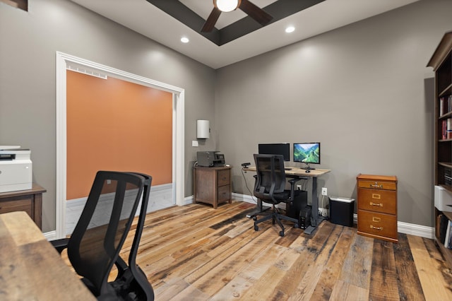 office featuring light wood-type flooring and ceiling fan