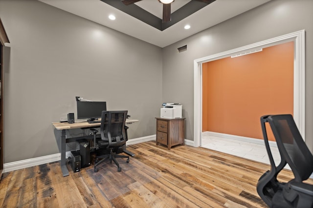 office featuring ceiling fan and hardwood / wood-style flooring