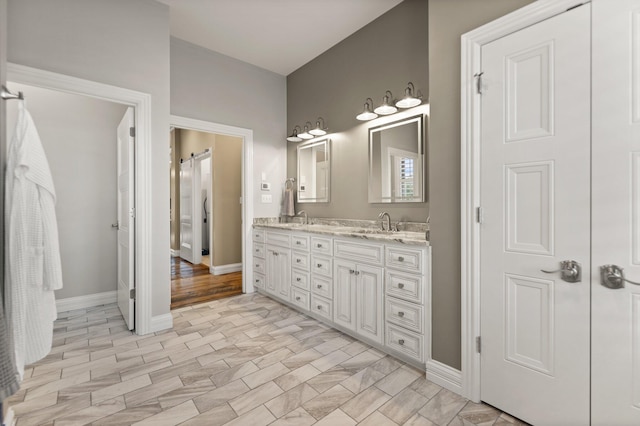 bathroom featuring vanity and hardwood / wood-style flooring