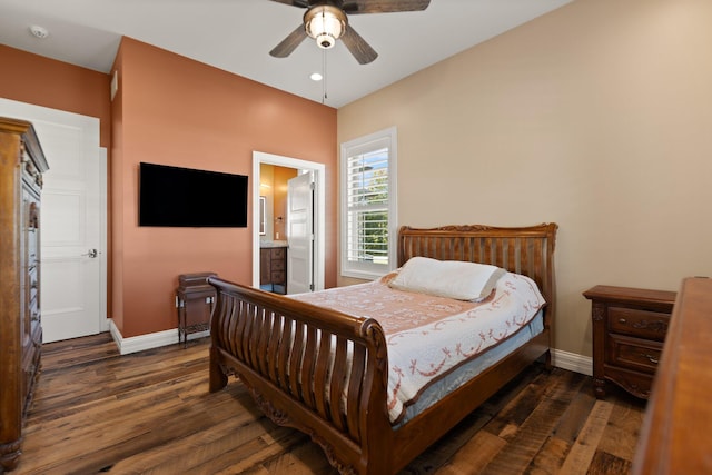 bedroom with dark hardwood / wood-style floors, ceiling fan, and ensuite bath