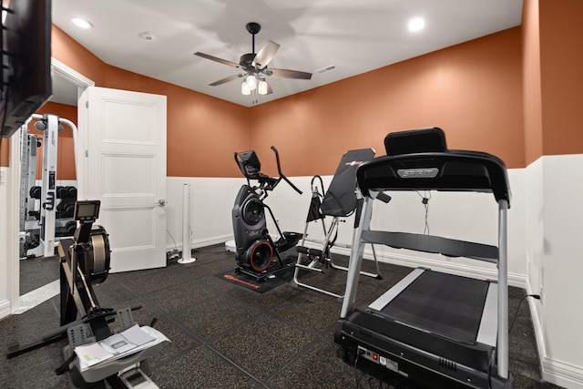 exercise room with ceiling fan