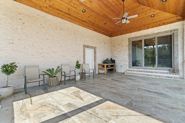 view of patio featuring ceiling fan