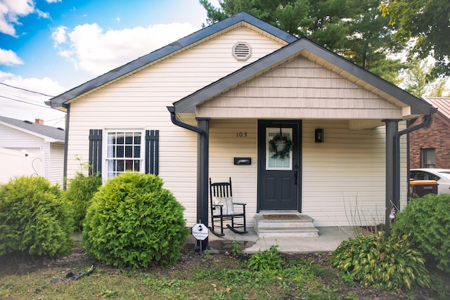 bungalow featuring covered porch