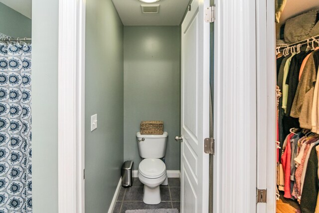 bathroom featuring tile patterned flooring and vanity