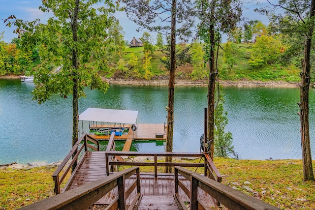 view of dock with a water view