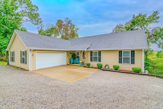 single story home with a garage