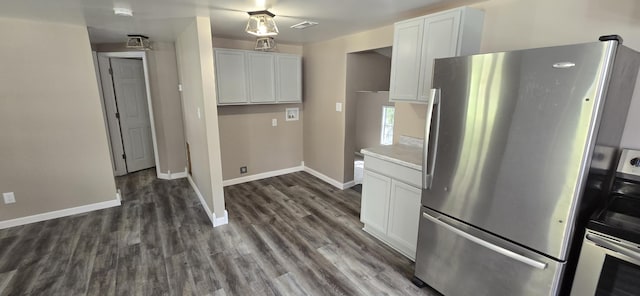 1835 Echo Point Rd, Bronston, KY 42518 - kitchen featuring freestanding refrigerator, baseboards, white cabinets, and dark wood finished floors