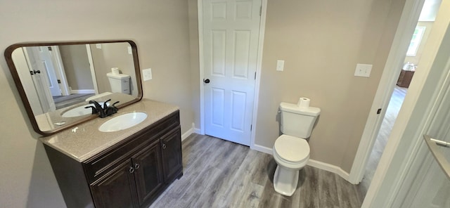 1835 Echo Point Rd, Bronston, KY 42518 - bathroom featuring toilet, vanity, and wood finished floors