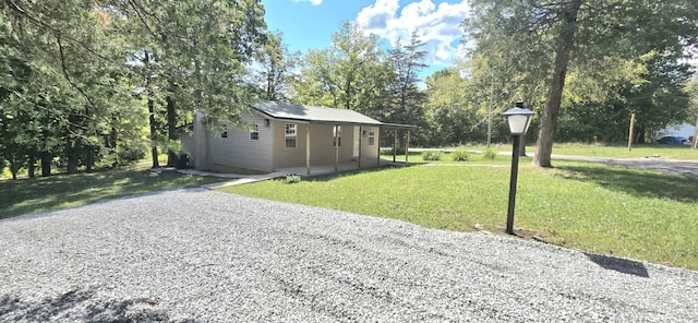 1835 Echo Point Rd, Bronston, KY 42518 - view of green lawn with view of wooded area