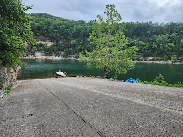1835 Echo Point Rd, Bronston, KY 42518 - water view with a boat ramp, a dock, and a heavily wooded area