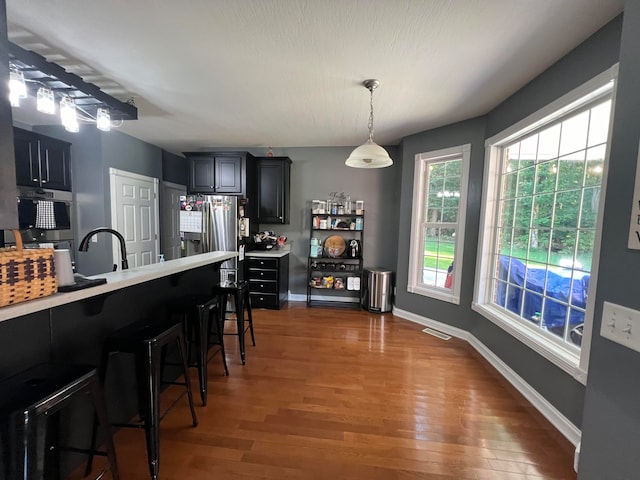 dining space featuring dark hardwood / wood-style floors