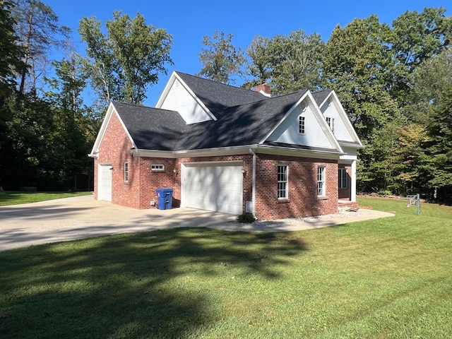 exterior space with a front yard and a garage