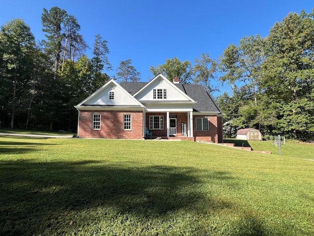 view of front of house featuring a porch and a front lawn