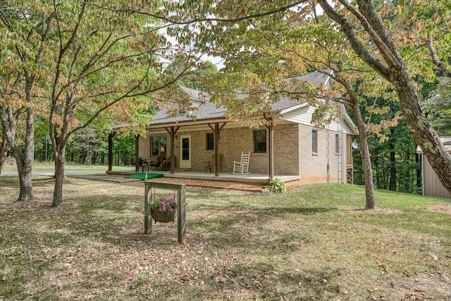 exterior space featuring a patio and a yard