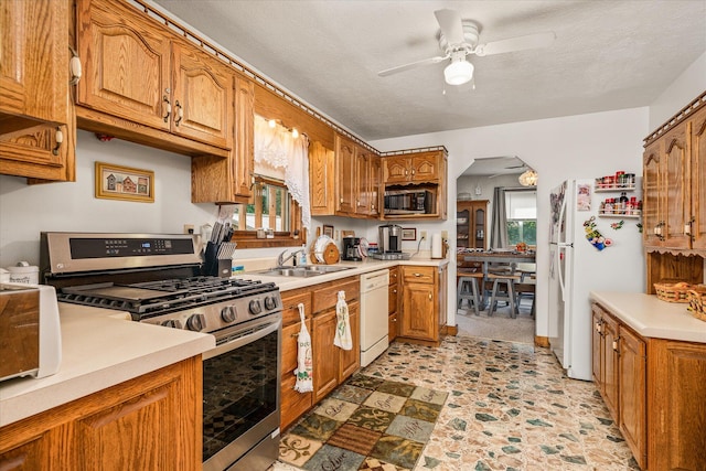 15 Oak Leaf Ln, Albany, KY 42602 - kitchen with ceiling fan, a textured ceiling, stainless steel appliances, and sink
