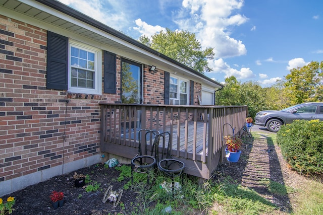 view of side of property with a deck