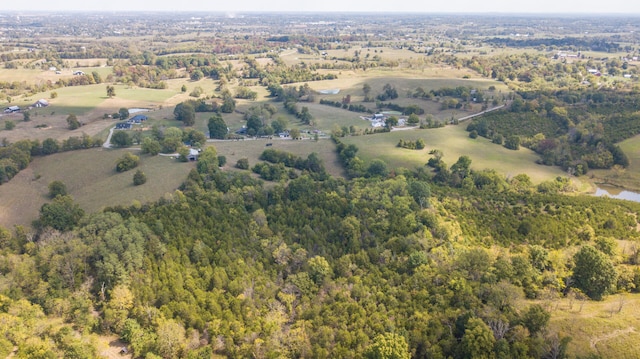 birds eye view of property featuring a rural view