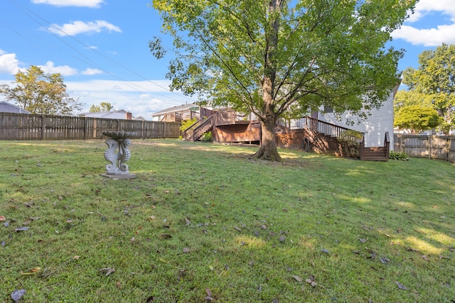 view of yard featuring a deck