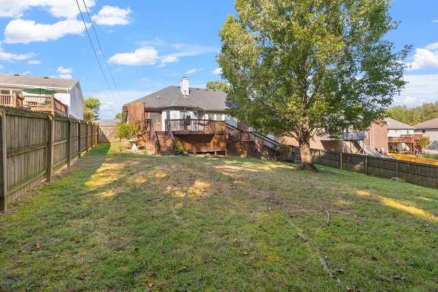 view of yard featuring a deck