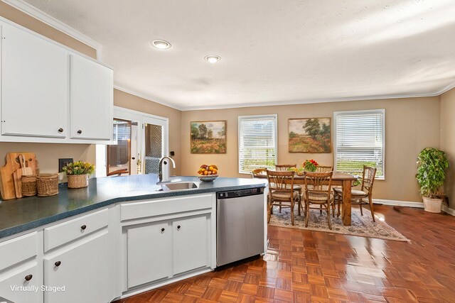 kitchen featuring crown molding, white cabinetry, sink, and dishwasher