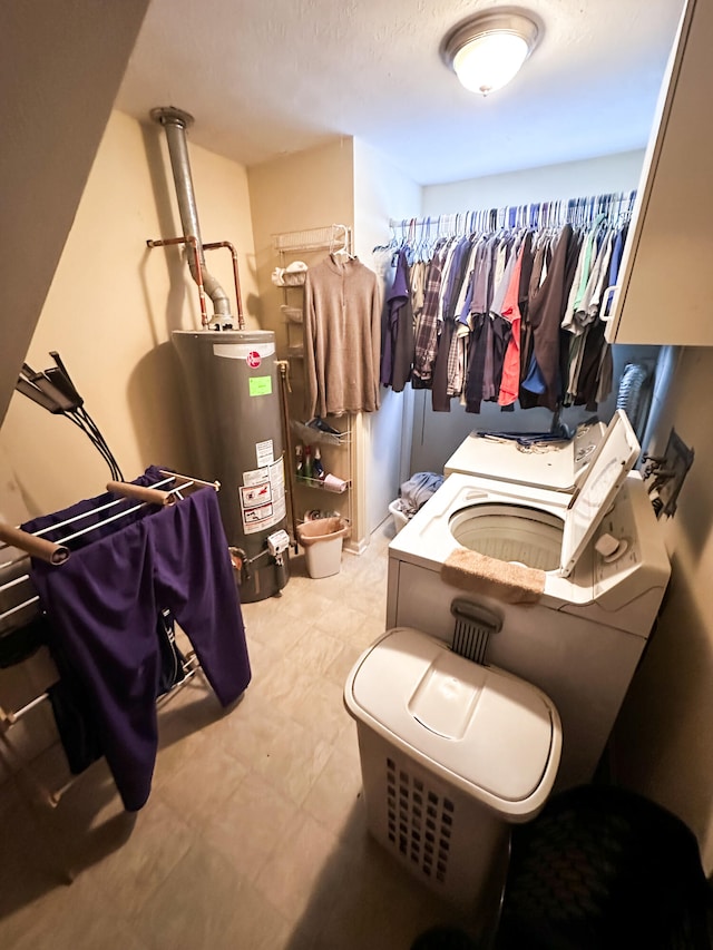 spacious closet featuring water heater