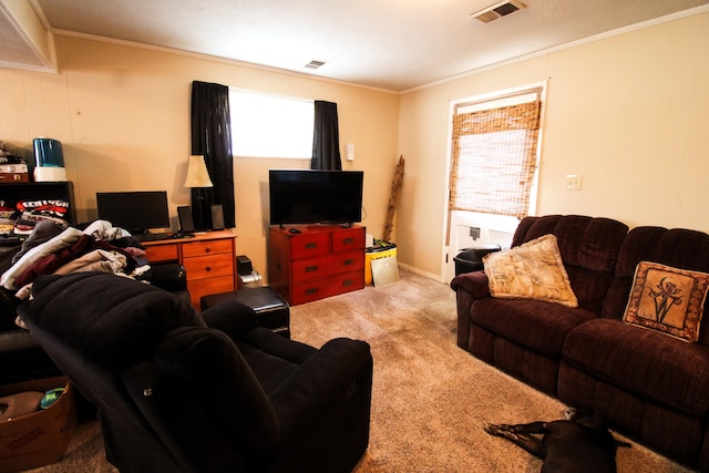 carpeted living room featuring a healthy amount of sunlight and crown molding