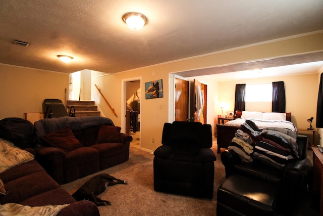 living room with carpet floors, a textured ceiling, and ornamental molding