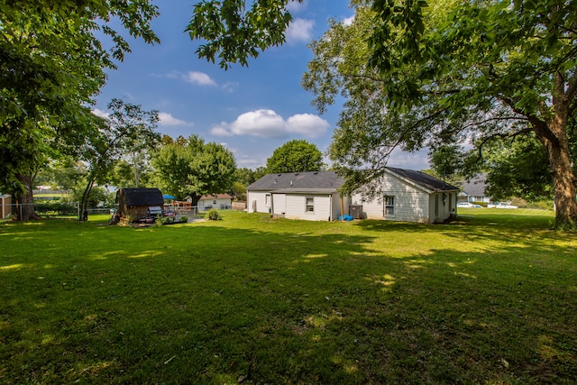 view of yard with a storage shed