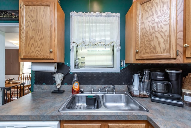 kitchen with backsplash and sink