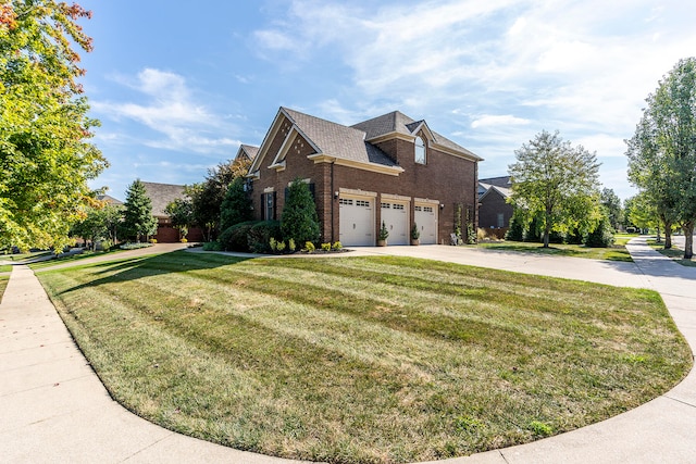 view of side of home with a lawn and a garage