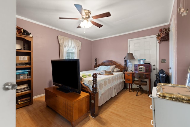 bedroom featuring light hardwood / wood-style flooring, ceiling fan, and crown molding