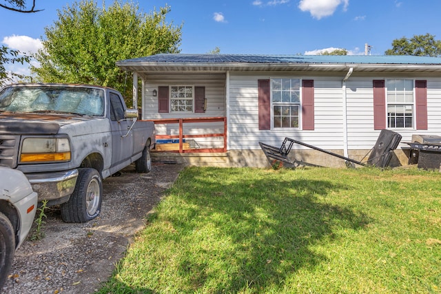 view of front of house with a front yard