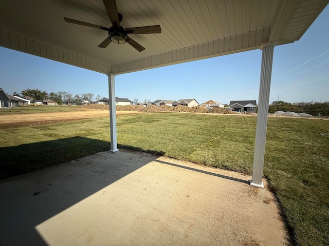 view of patio featuring a residential view and ceiling fan