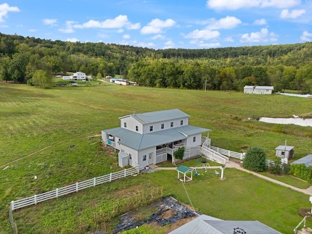 birds eye view of property featuring a rural view